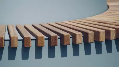 Primer plano de una estructura de madera, simbolizando la solidez y la continuidad necesaria en un negocio familiar, acompañada de un checklist de 15 claves para asegurar su continuidad.
